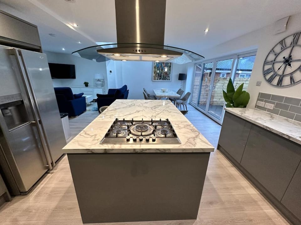 Kitchen or kitchenette, dishwasher, oven, stove