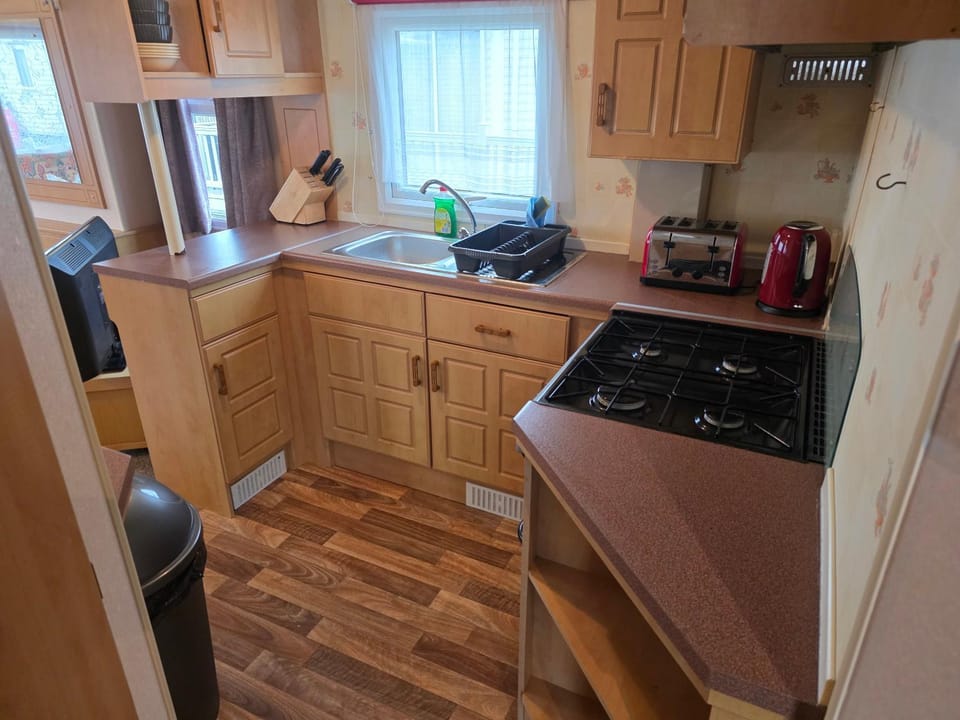 Kitchen or kitchenette, stove, kitchen