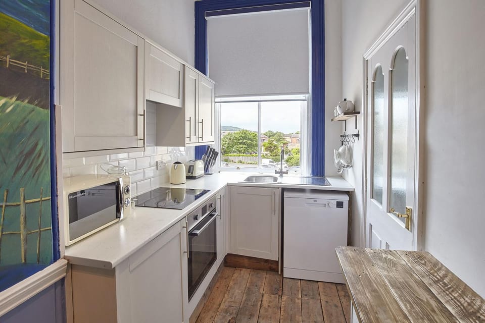 Kitchen or kitchenette, oven, stove