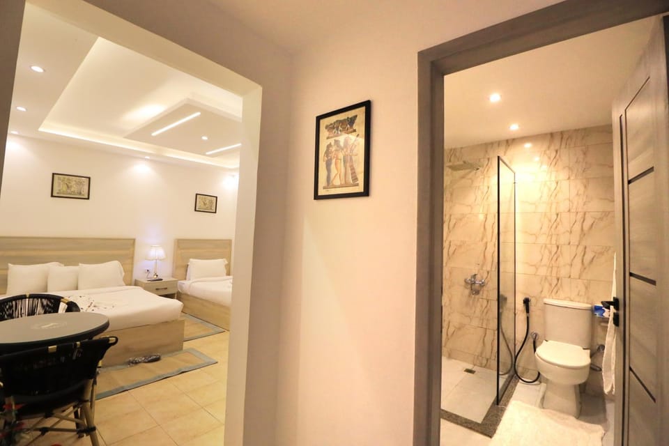 Shower, Toilet, Bed, Bathroom, Photo of the whole room, Bedroom, towels