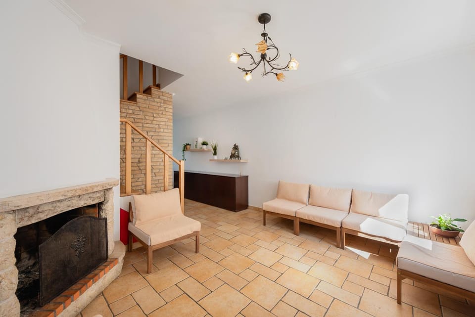 Communal lounge/ TV room, fireplace