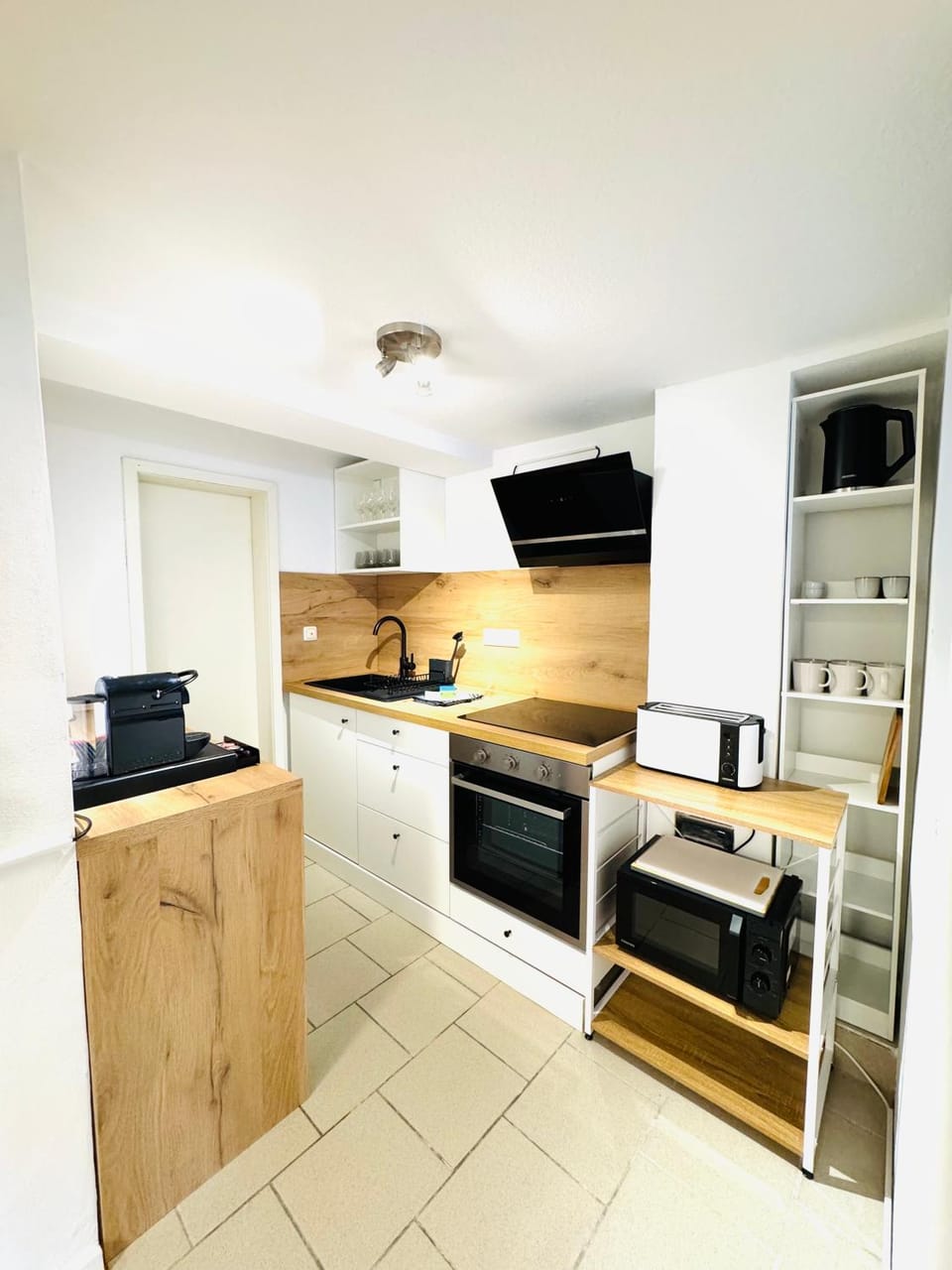 Kitchen or kitchenette, microwave, oven, stove, toaster
