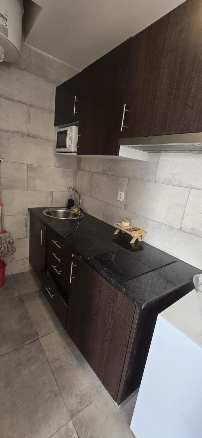 Kitchen or kitchenette, stove