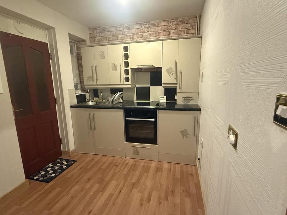 Kitchen or kitchenette, oven, stove