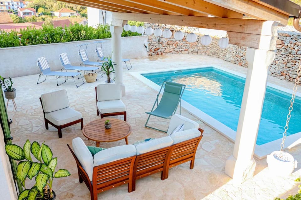 Patio, Day, Balcony/Terrace, Seating area, Pool view, Swimming pool, sunbed