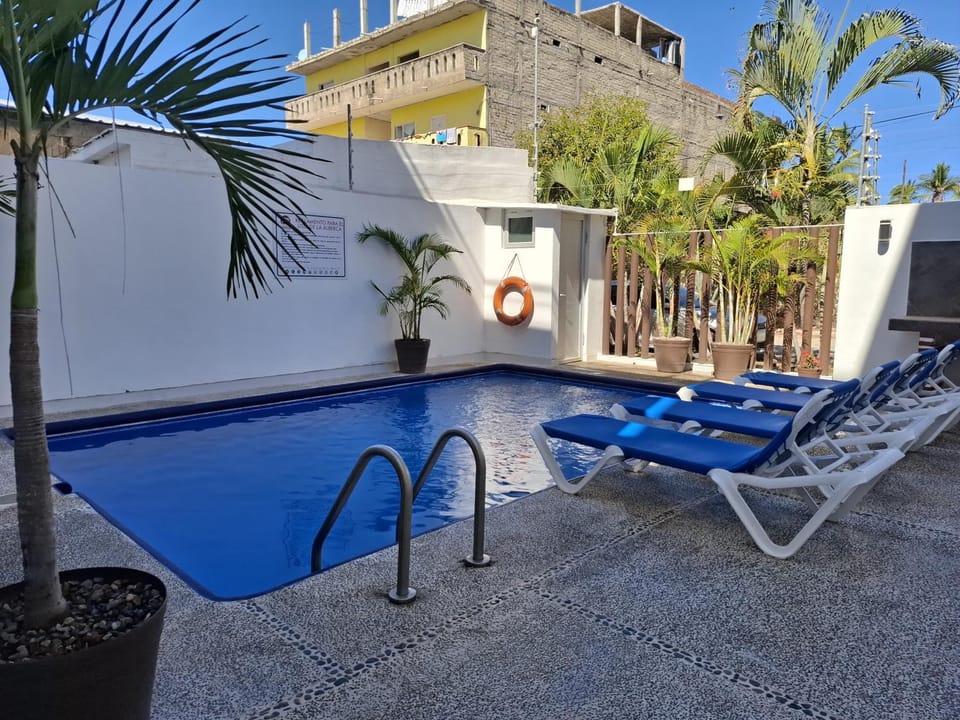 Swimming pool, sunbed