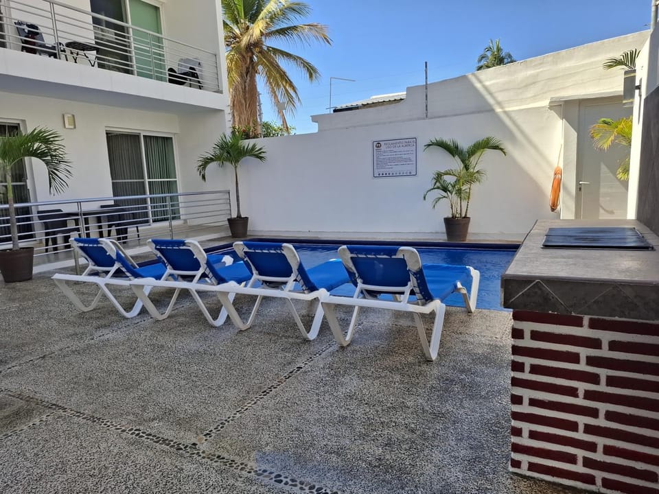 Patio, BBQ facilities, Swimming pool, sunbed