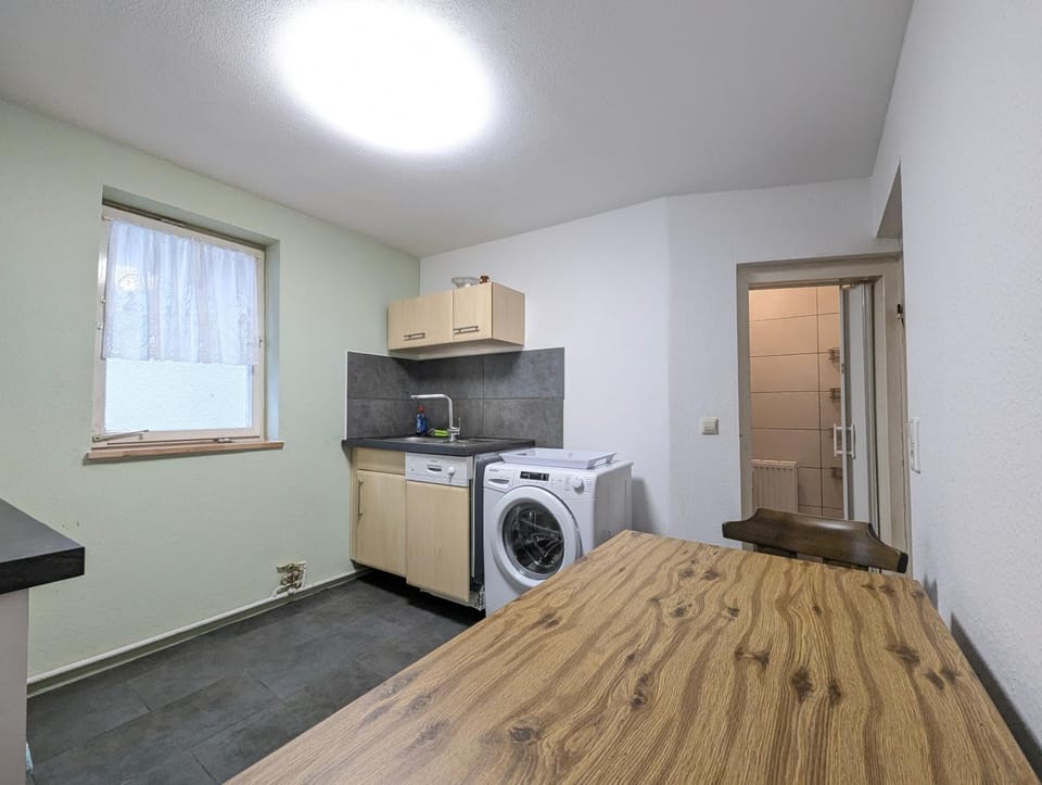 Kitchen or kitchenette, dishwasher, oven, stove, washing machine