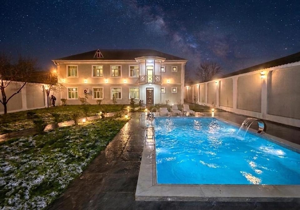 Property building, Facade/entrance, Night, Pool view