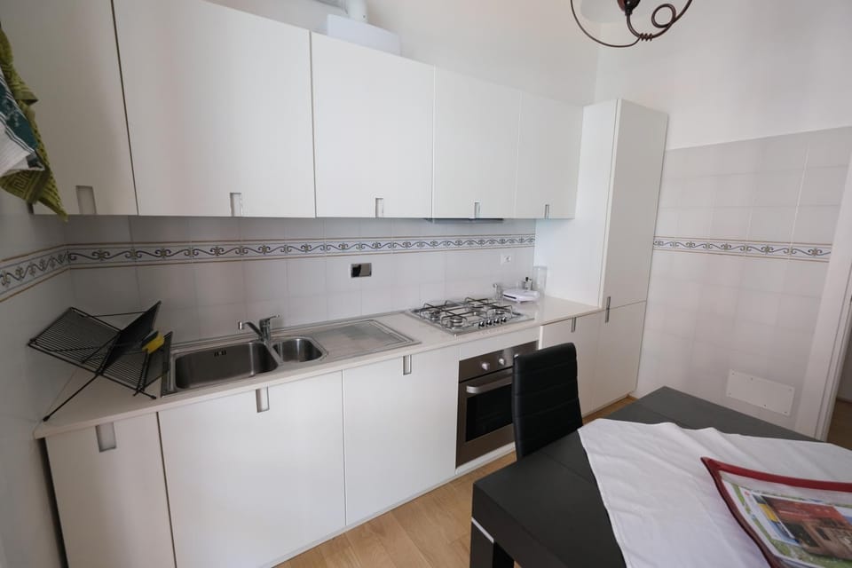 Kitchen or kitchenette, oven, stove
