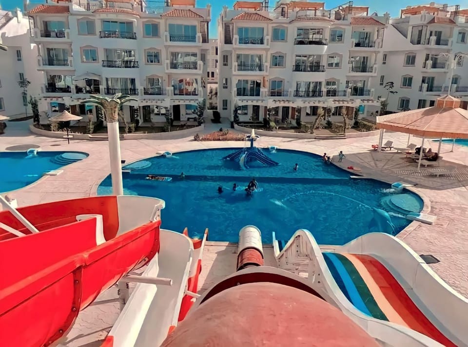 Property building, Aqua park, Swimming pool, Entertainment, sunbed