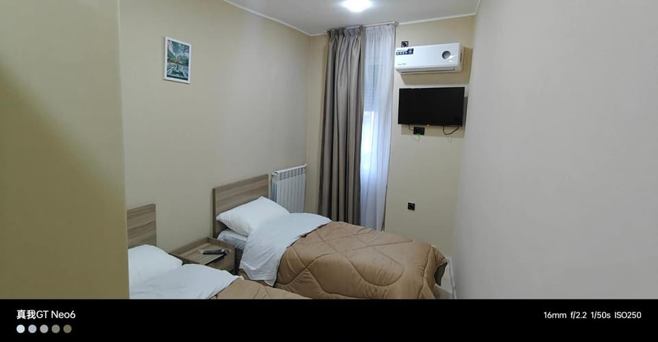 Bed, TV and multimedia, Bedroom, towels, air conditioner