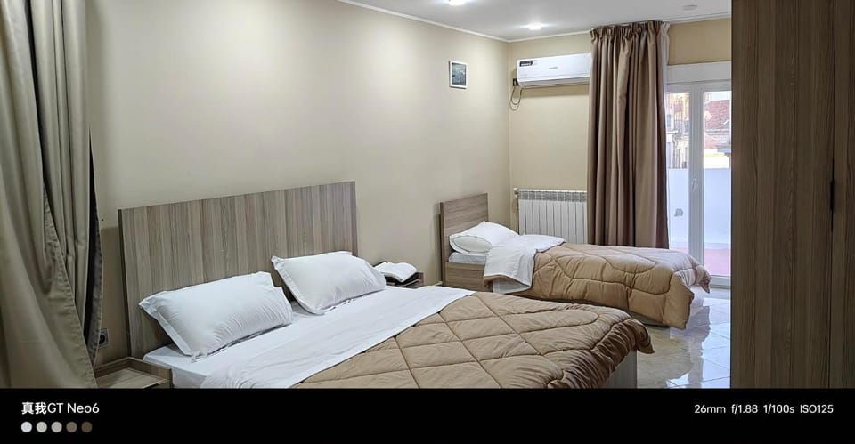 Bed, Photo of the whole room, Bedroom, towels, air conditioner