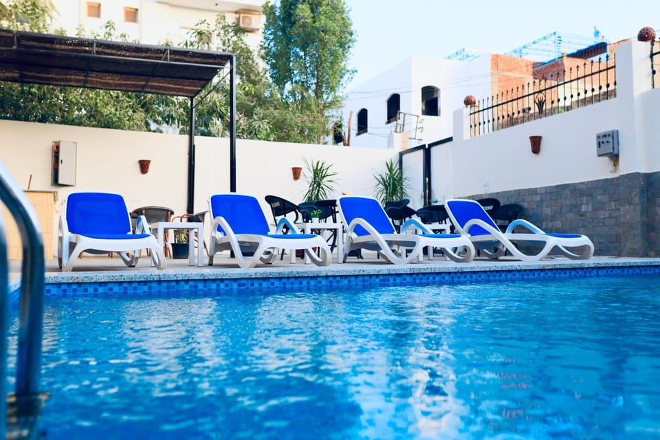 Swimming pool, sunbed