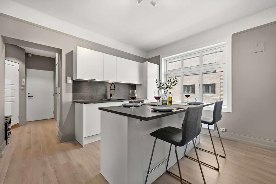 Kitchen or kitchenette, dishwasher, oven, stove