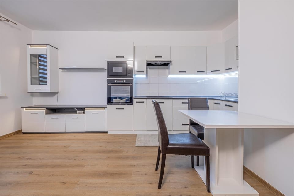 Dining area, microwave, oven, kitchen