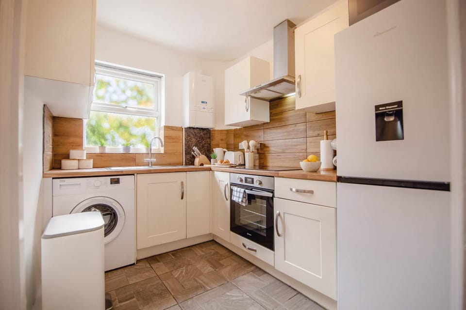 Kitchen or kitchenette, oven, stove, toaster