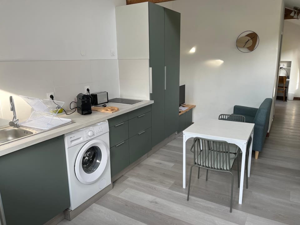 Living room, Dining area, oven, stove, washing machine