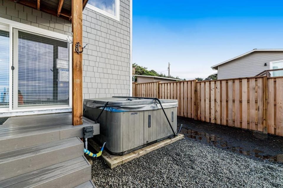 Oceanfront home with hot tub private beach access & ocean views - dog-friendly House in Newport