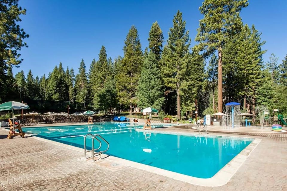 Cozy mountain condo with shared pool & hot tub access balcony and skiing nearby House in Northstar Drive