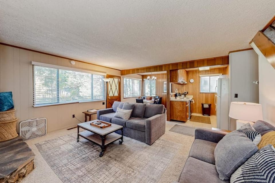 Classic central cabin near river with large tree-lined deck grassy yard & gym Cabin in South Lake Tahoe