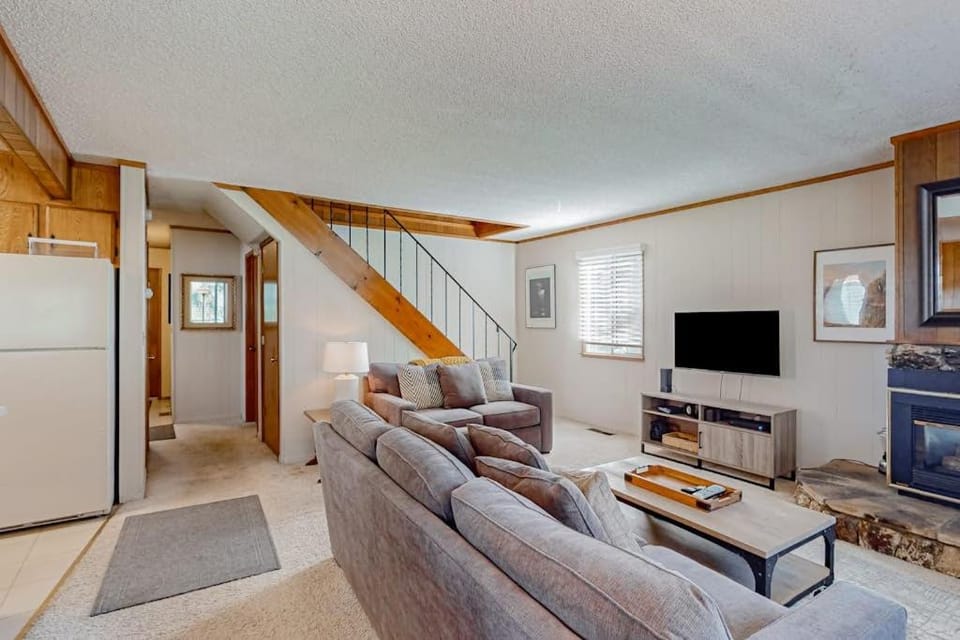 Classic central cabin near river with large tree-lined deck grassy yard & gym Cabin in South Lake Tahoe