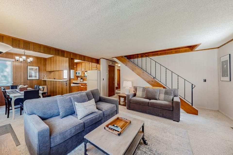 Classic central cabin near river with large tree-lined deck grassy yard & gym Cabin in South Lake Tahoe