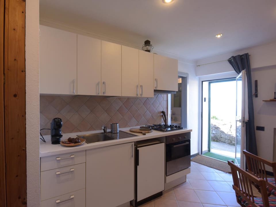 Kitchen or kitchenette, oven