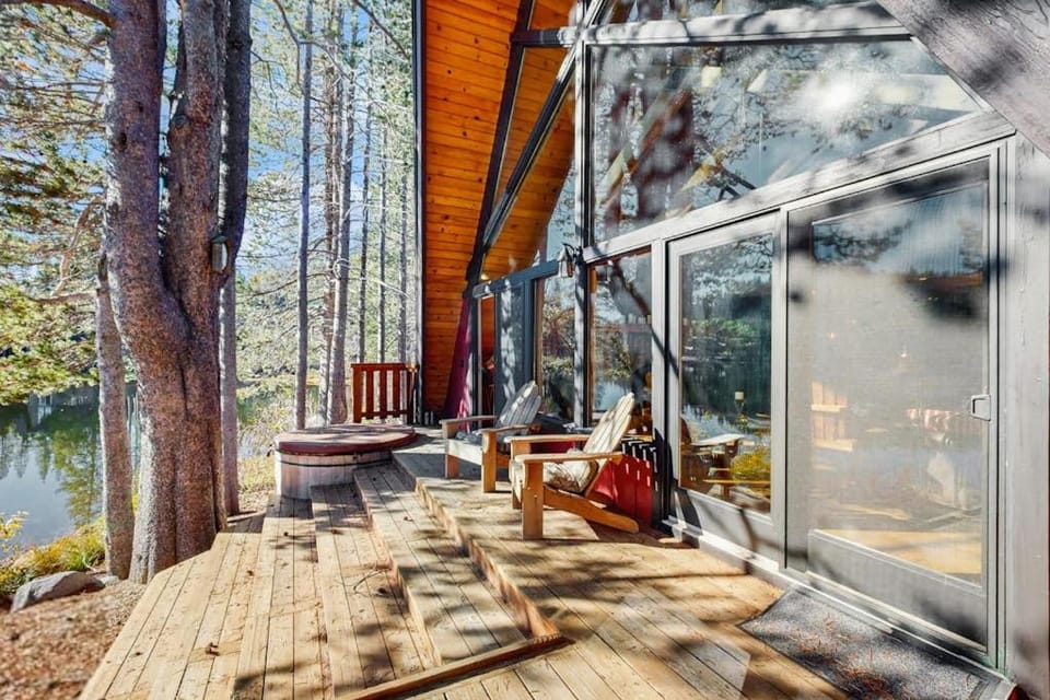 Luxury lakefront home with private hot tub on-site dock fireplace & HOA beach House in Serene Lakes