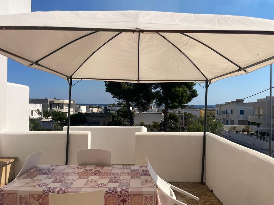 Property building, Day, View (from property/room), Balcony/Terrace, Seating area, Dining area