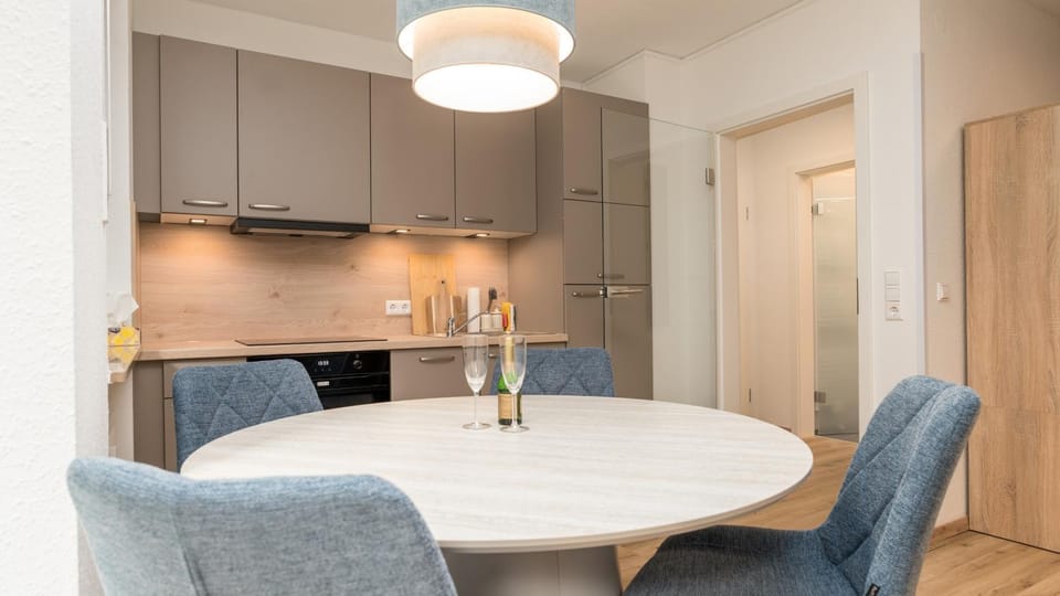 Seating area, Dining area, dishwasher, oven, stove, kitchen