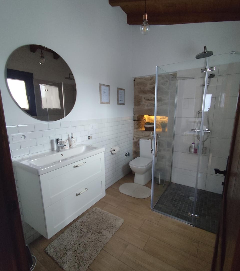 Toilet, Bathroom, flat iron, hair dryier, towels