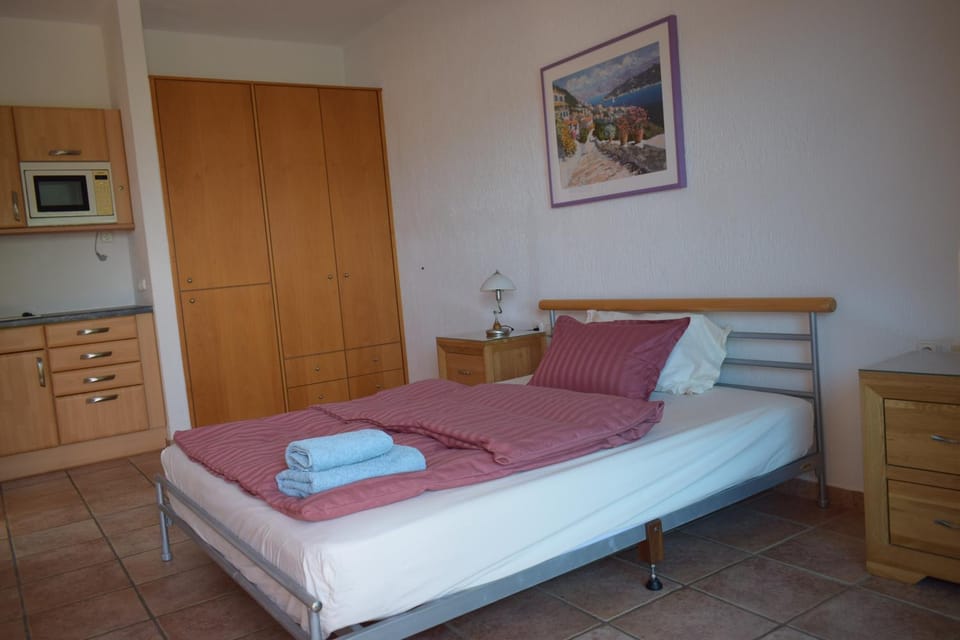 Bed, Photo of the whole room, Bedroom, towels, wardrobe