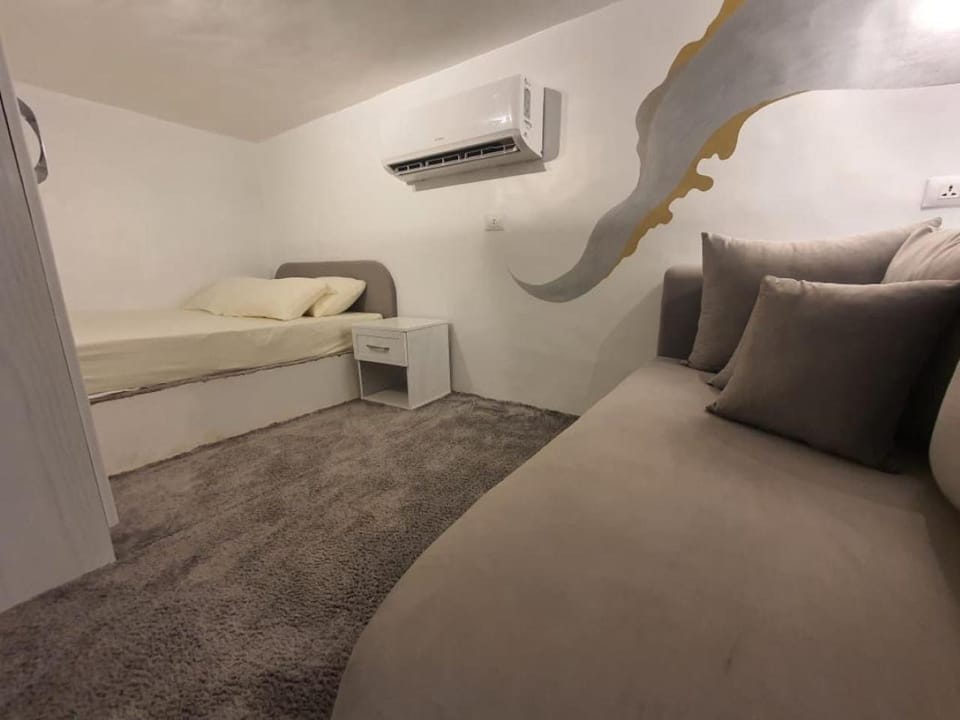 Bed, Seating area, Bedroom