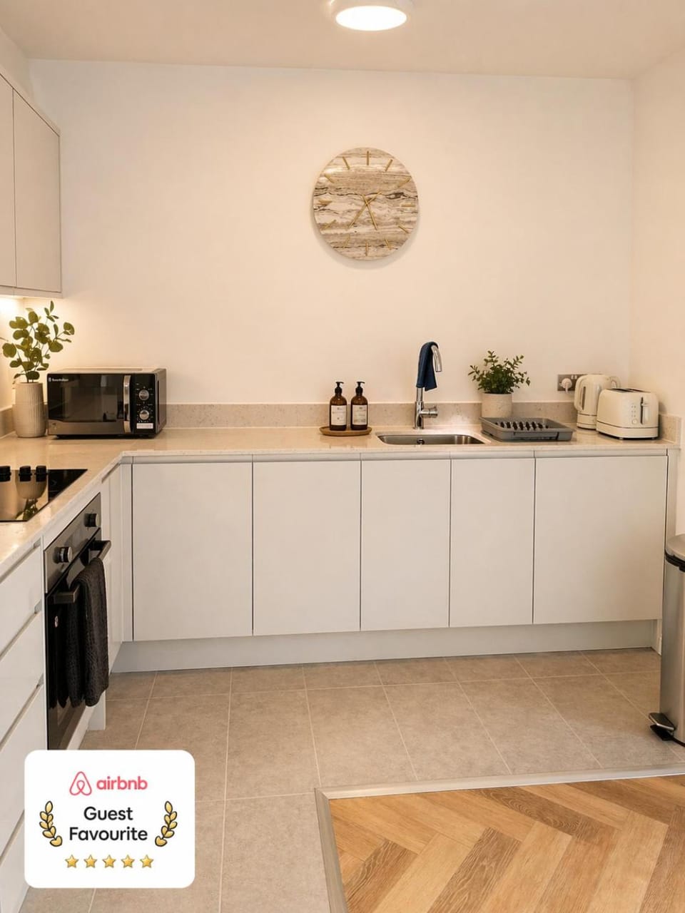Kitchen or kitchenette, dishwasher, microwave, oven, stove, washing machine