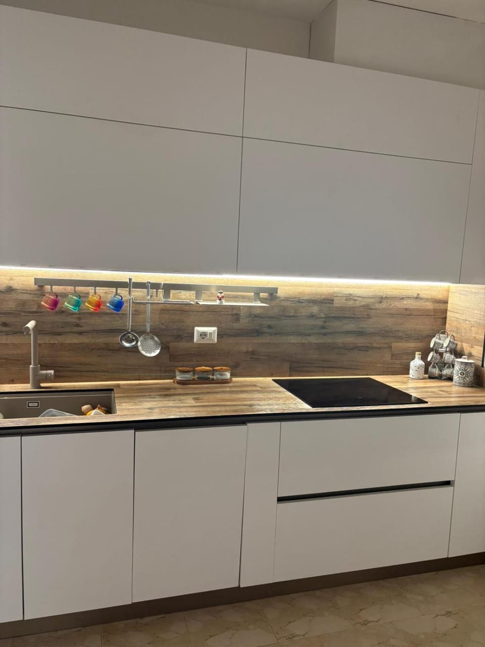 Kitchen or kitchenette, dishwasher, microwave, oven