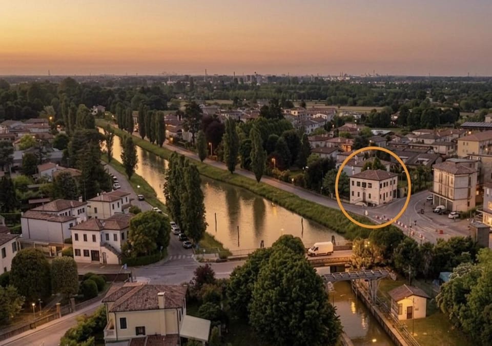 Property building, Natural landscape, Bird's eye view, River view, Sunset