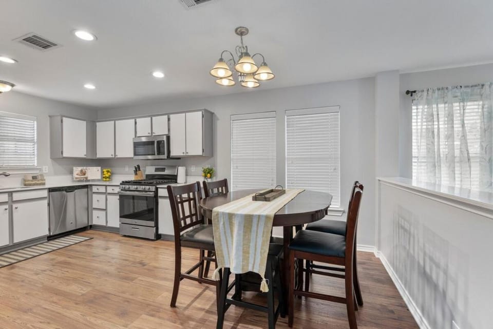 Dining area, dishwasher, oven, stove