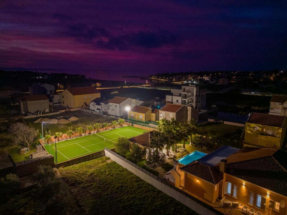 Property building, Night, Bird's eye view, Tennis court, Pool view