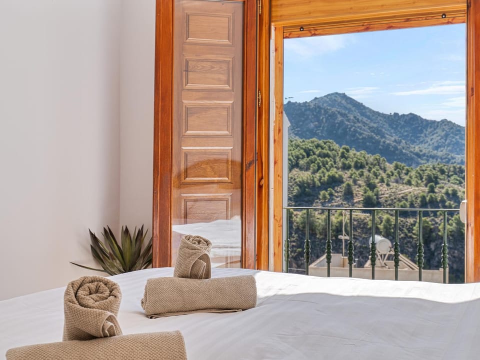 Bed, Natural landscape, Decorative detail, Bedroom, Mountain view, towels