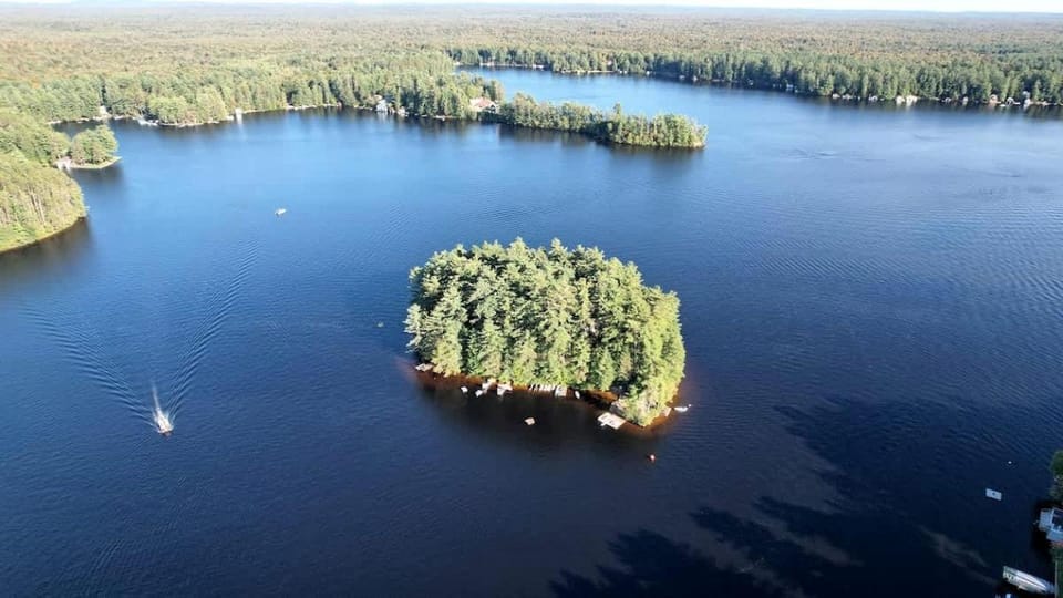 Unique Floating Home on Private Island for a Memorable Romantic Escape on Brantingham Lake, New York Docked boat in Brantingham Lake