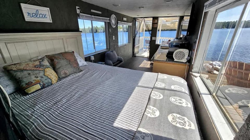 Unique Floating Home on Private Island for a Memorable Romantic Escape on Brantingham Lake, New York Docked boat in Brantingham Lake