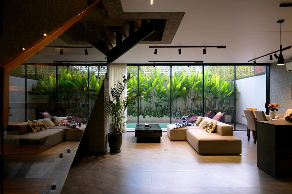 Living room, Seating area, Dining area, Garden view, Pool view