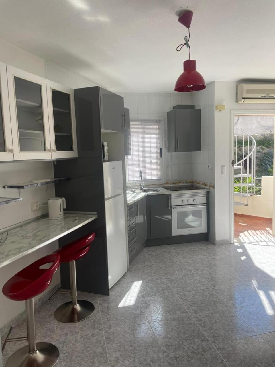 Kitchen or kitchenette, oven, stove, washing machine
