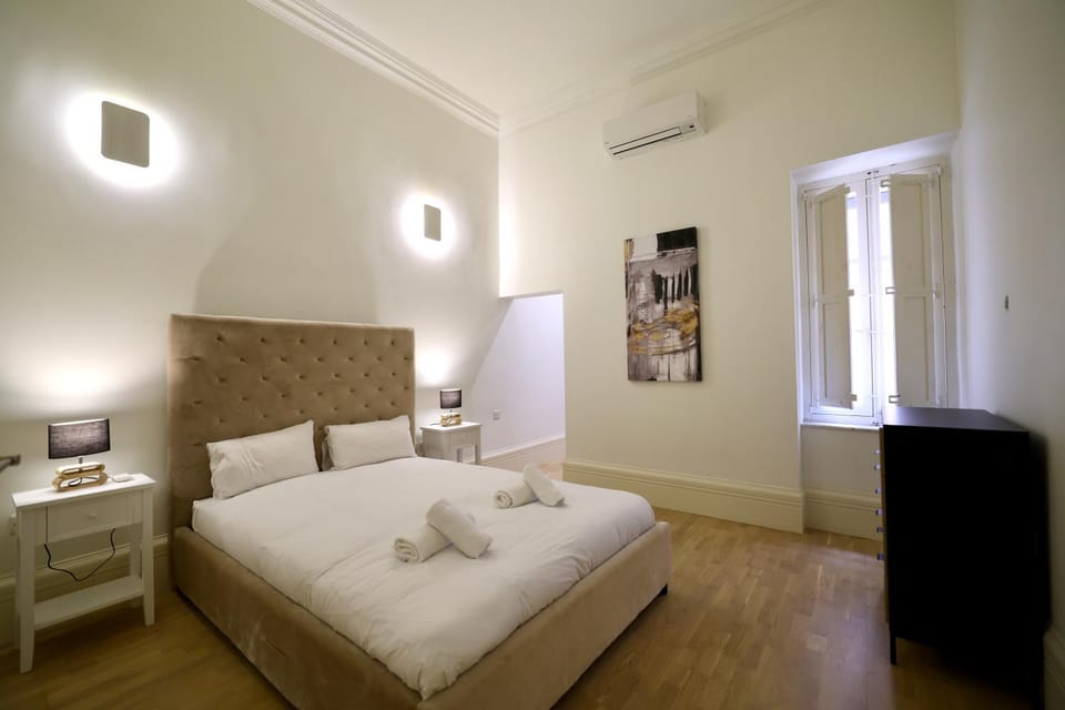 Bed, Photo of the whole room, Bedroom, towels, air conditioner