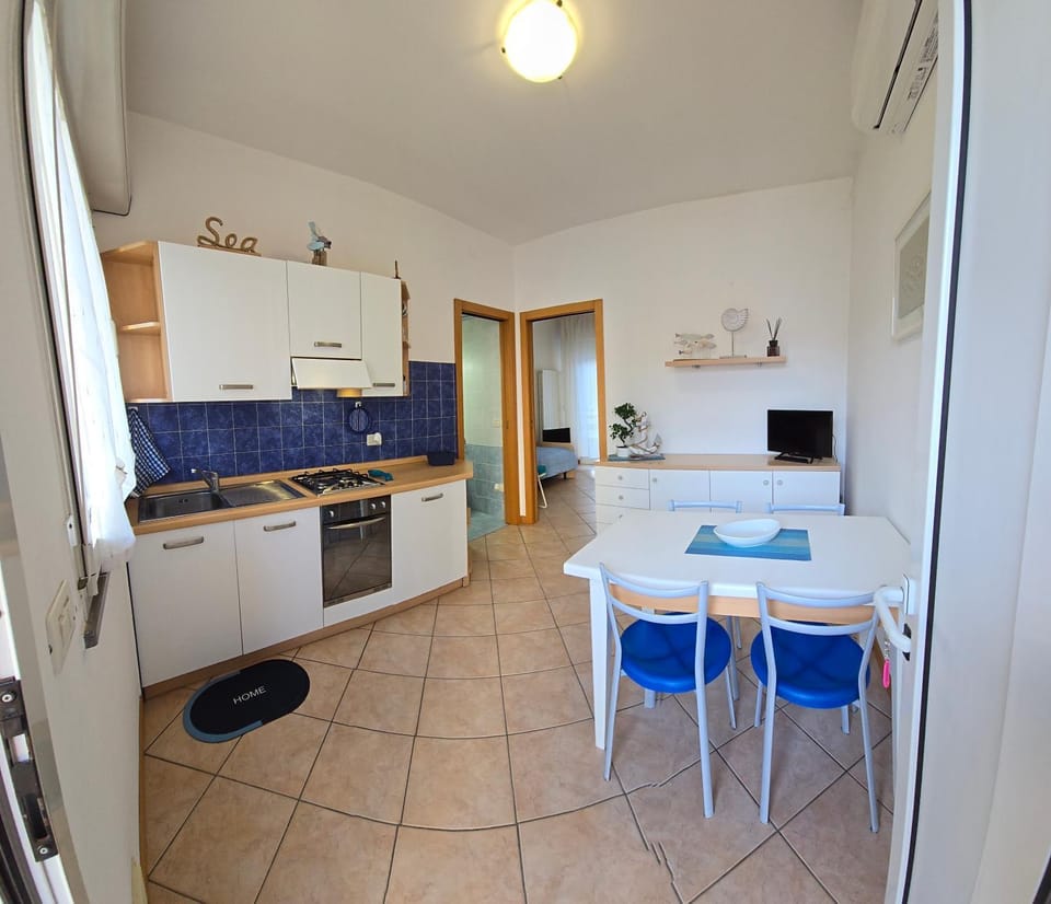 Dining area, dishwasher, oven, stove