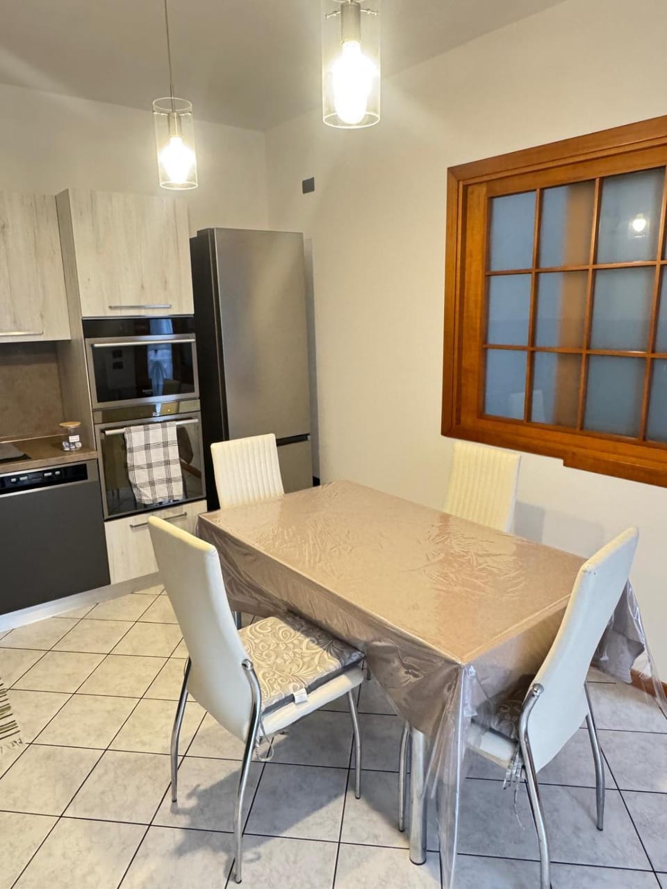 Kitchen or kitchenette, dishwasher, oven, stove