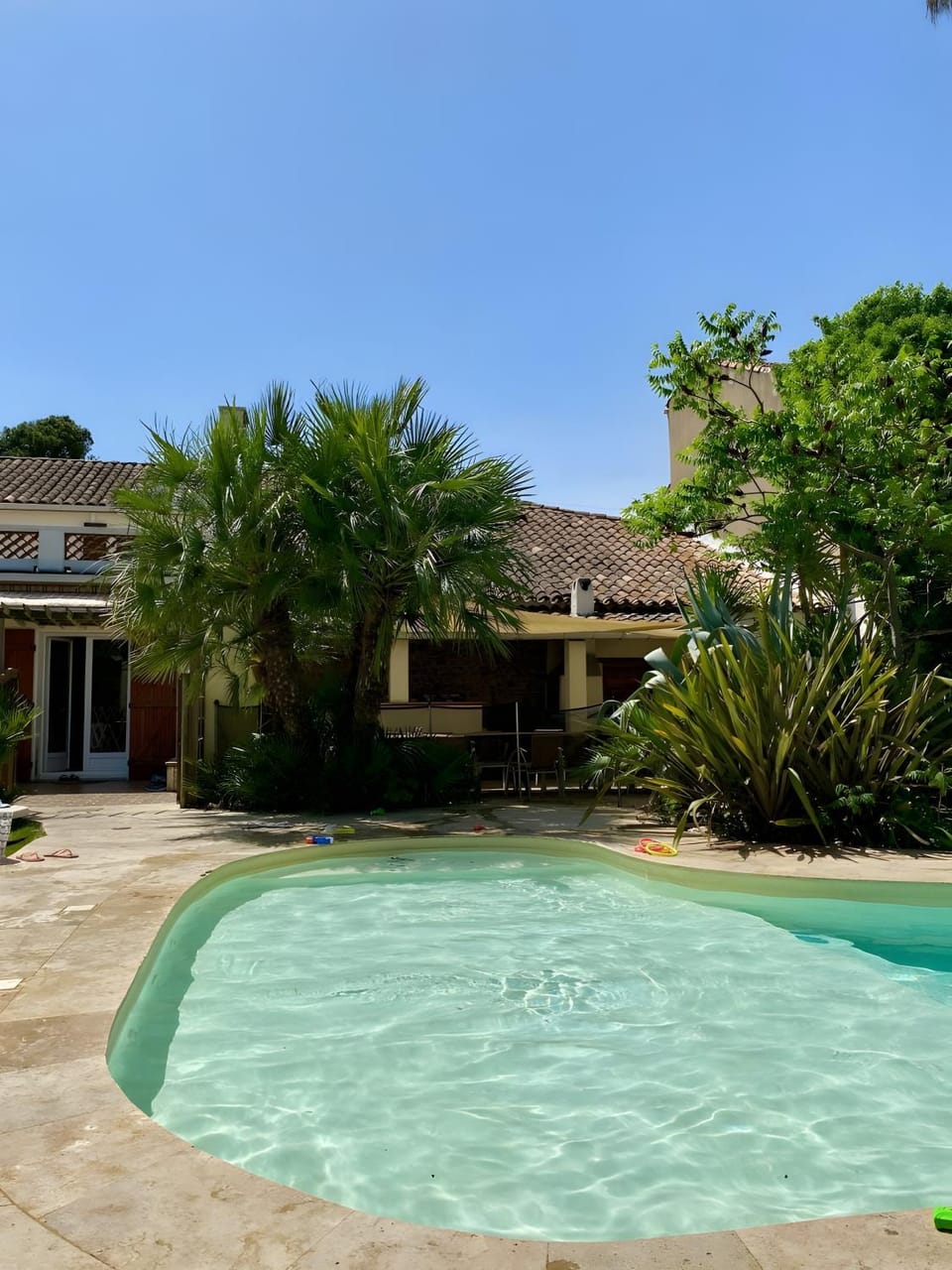 Property building, Living room, Swimming pool