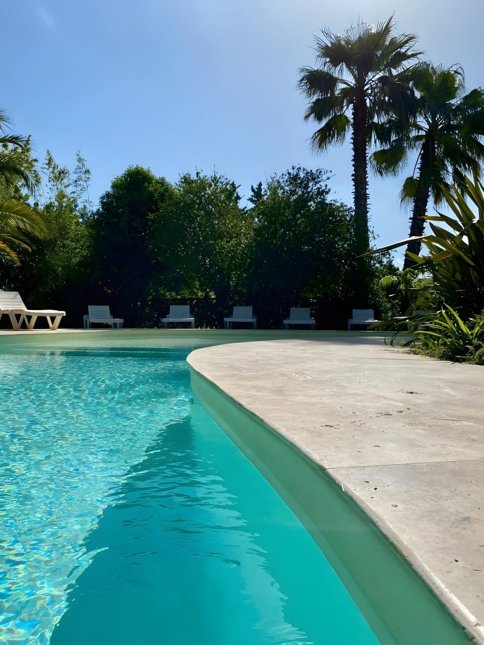 Property building, Living room, Swimming pool