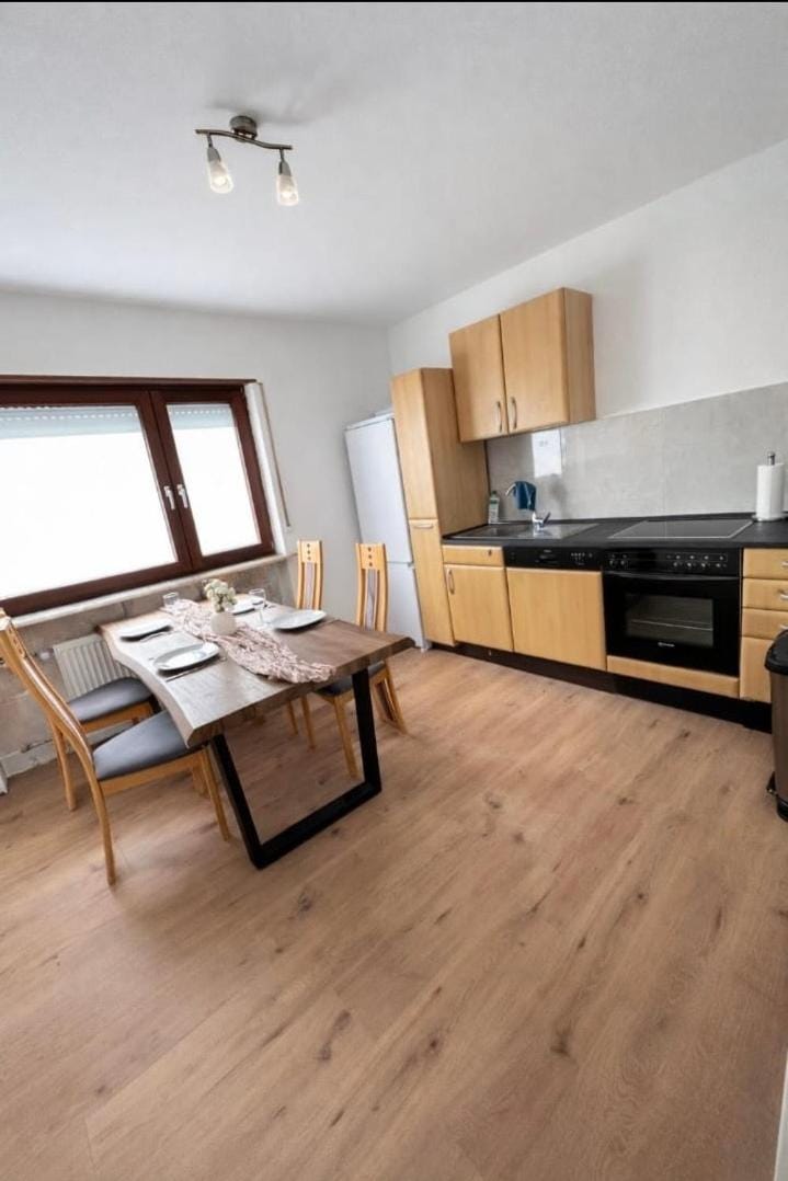 Kitchen or kitchenette, Seating area, Dining area, dishwasher, oven, stove